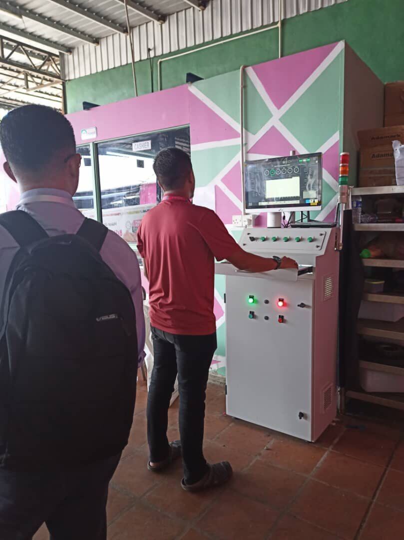 Gemba walk around machinery during a manufacturing site assessment